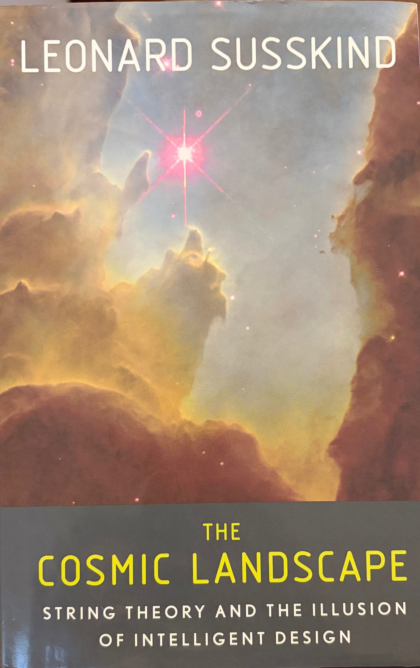 The Cosmic Landscape: String Theory and the Illusion of Intelligent Design